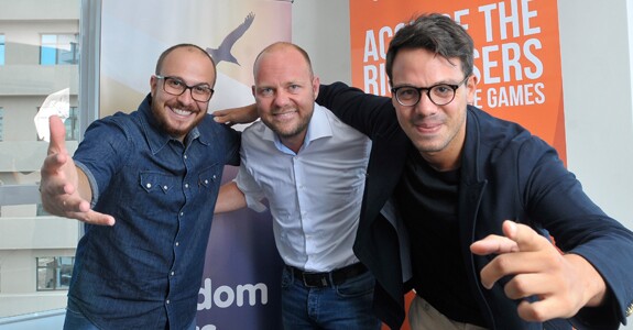 Divulgação Gustavo Teles, head da nevaly, Stephan Stricker, VP global da ad2games e o João Gomes, head para Brasil e AL da ad2games (Div) (2)