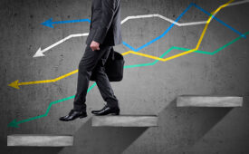 Low section view of a businessman moving down on stairs representing the concept of Loss, Failure, Problems etc.