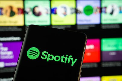 Como o Spotify paga os artistas e compositores?